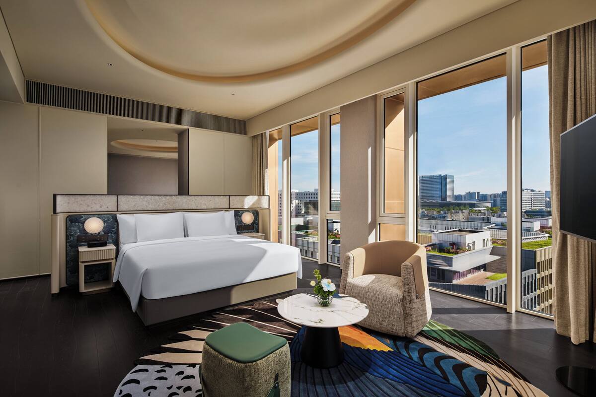 Suite, 1 King Bed, City View | Minibar, in-room safe, blackout drapes, free cribs/infant beds