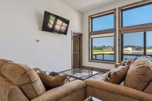 Smart TV, fireplace, books