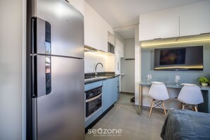 Traditional Apartment | Private kitchen - Complete Stay by the Sea, Just 10 Meters From the Beach - Aars (Florianópolis)