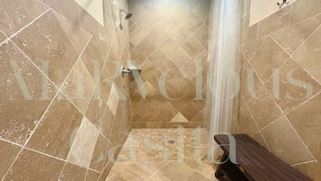 Shower, hair dryer, towels, soap