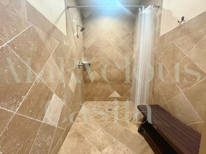 Shower, hair dryer, towels, soap