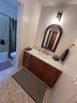 Hair dryer, towels, soap, toilet paper