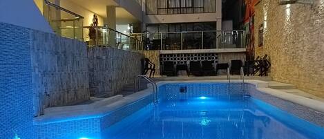 Outdoor pool, pool umbrellas, pool loungers