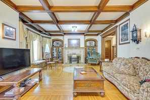 TV, fireplace, books