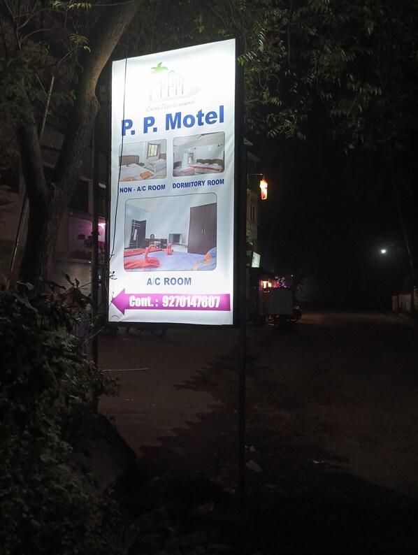 A P. P. Motel signboard with room types and contact number. - Ppmotel alibag  (Alibag)