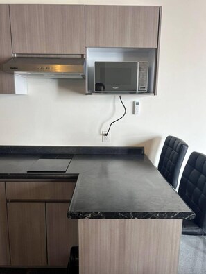 Classic Apartment, Balcony, Mountain View | Private kitchen | Fridge, coffee/tea maker