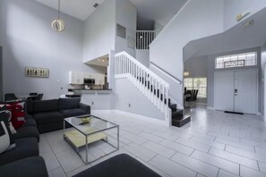 House | Living area | 75-inch Smart TV with digital channels, streaming services