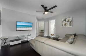 House | Living area | 75-inch Smart TV with digital channels, table football