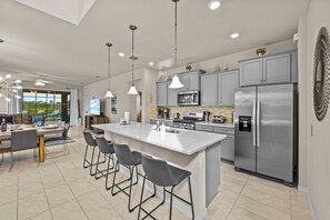 Full-size fridge, microwave, oven, stovetop - Solterra 6Br Luxury Villa W/ Pool & Resort Access (Davenport)