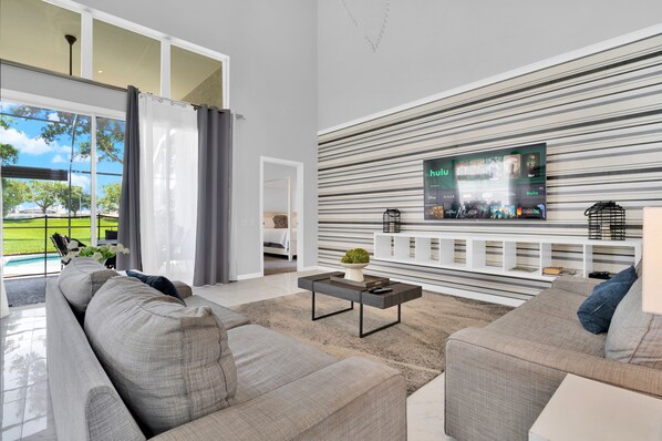 House | Living area | 55-inch Smart TV with digital channels, table football