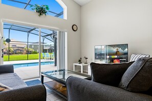 55-inch Smart TV with digital channels, streaming services - Emerald Island Retreat Near Parks (Kissimmee)