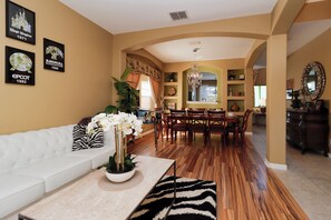 House | Living area | 55-inch Smart TV with digital channels, table football - 7 Bedrooms Perfect For Large Families Or Groups! (Kissimmee)