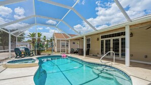 A covered outdoor swimming pool with a clear blue water, surrounded by a white canopy structure. - Renovated 1925 Bungalow • Heated Pool • 3BR En-Suite • 2 Mi to Venice Beach (Venice)