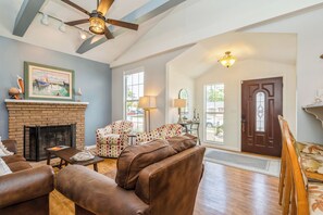 Smart TV, fireplace, books, printers