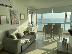 Comfort Apartment, Balcony, Beach View | Living area