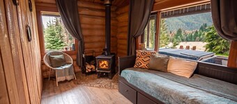 Off-Grid Wilderness Cabin with Mountain Views, Hot Tub, Sauna & Canoes