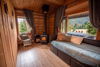 Off-Grid Wilderness Cabin with Mountain Views, Hot Tub, Sauna & Canoes