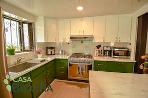 Family House, Garden View | Private kitchen | Coffee/tea maker, electric kettle