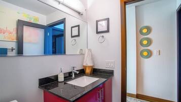 Shower, eco-friendly toiletries, hair dryer, towels