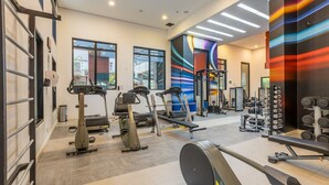 A modern gym with treadmills, elliptical machines, and weightlifting equipment. - Modern Studio Just 300m From Moema Metro Sqc0810 (São Paulo)