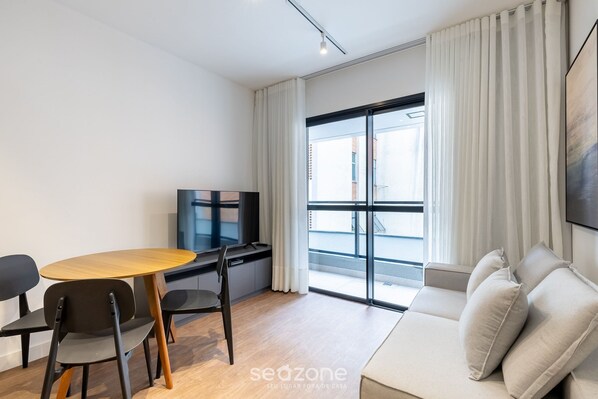 Basic Apartment | Living area | 32-inch Smart TV with digital channels