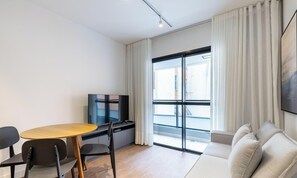 Basic Apartment | Living area | 32-inch Smart TV with digital channels