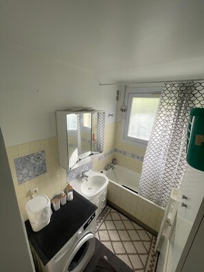 Hair dryer, towels, soap, toilet paper