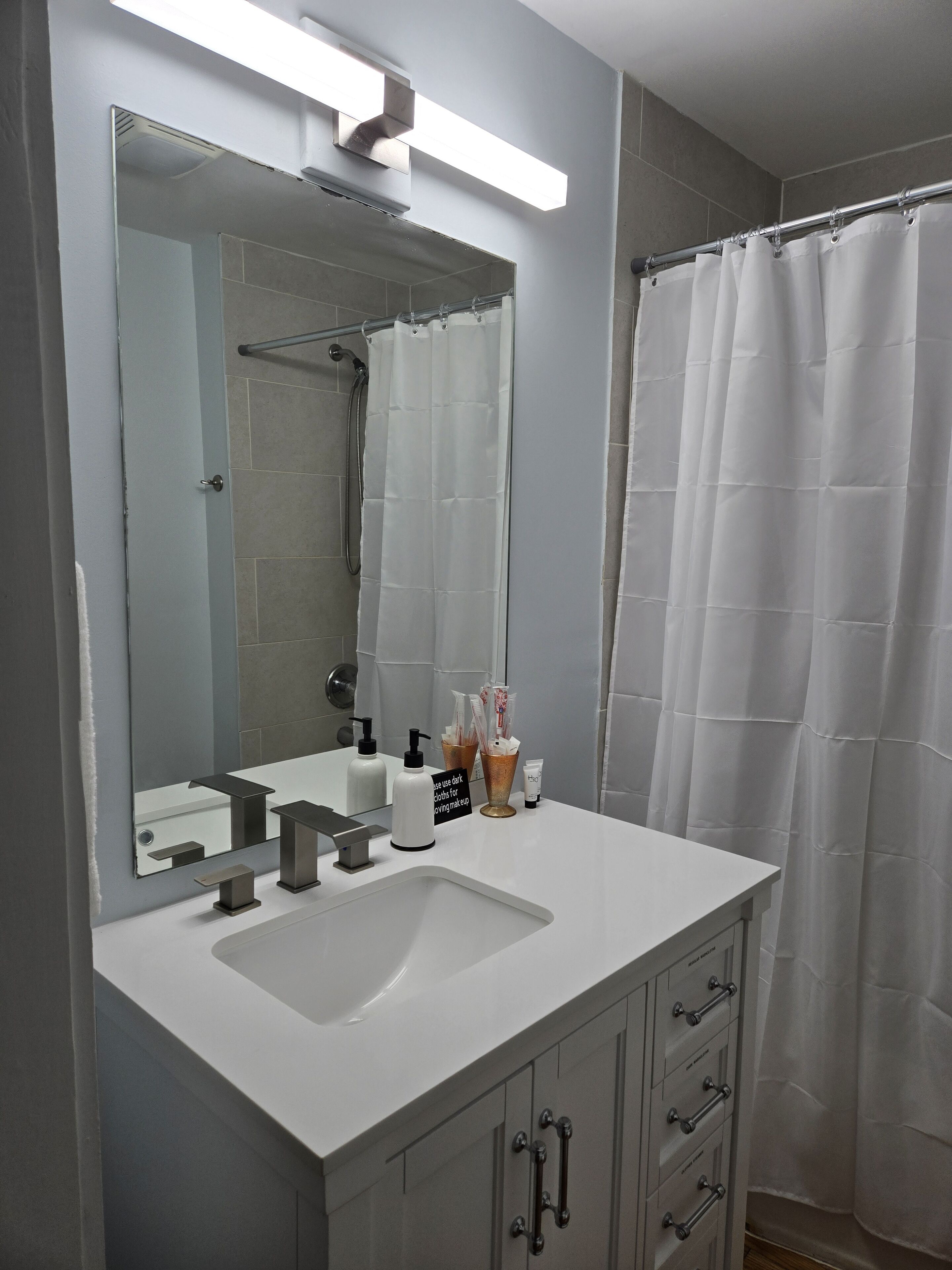 Hair dryer, towels, soap, shampoo