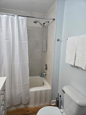 Hair dryer, towels, soap, toilet paper