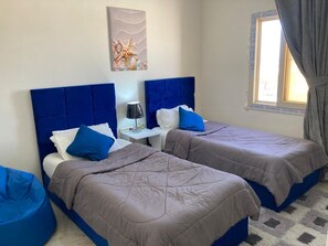 4 slaapkamers, een strijkplank/strijkijzer, internet, beddengoed