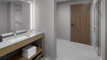 Suite, 1 cama King size y sofá cama, cocineta | Baño | Secadora de cabello, toallas, jabón, shampoo
