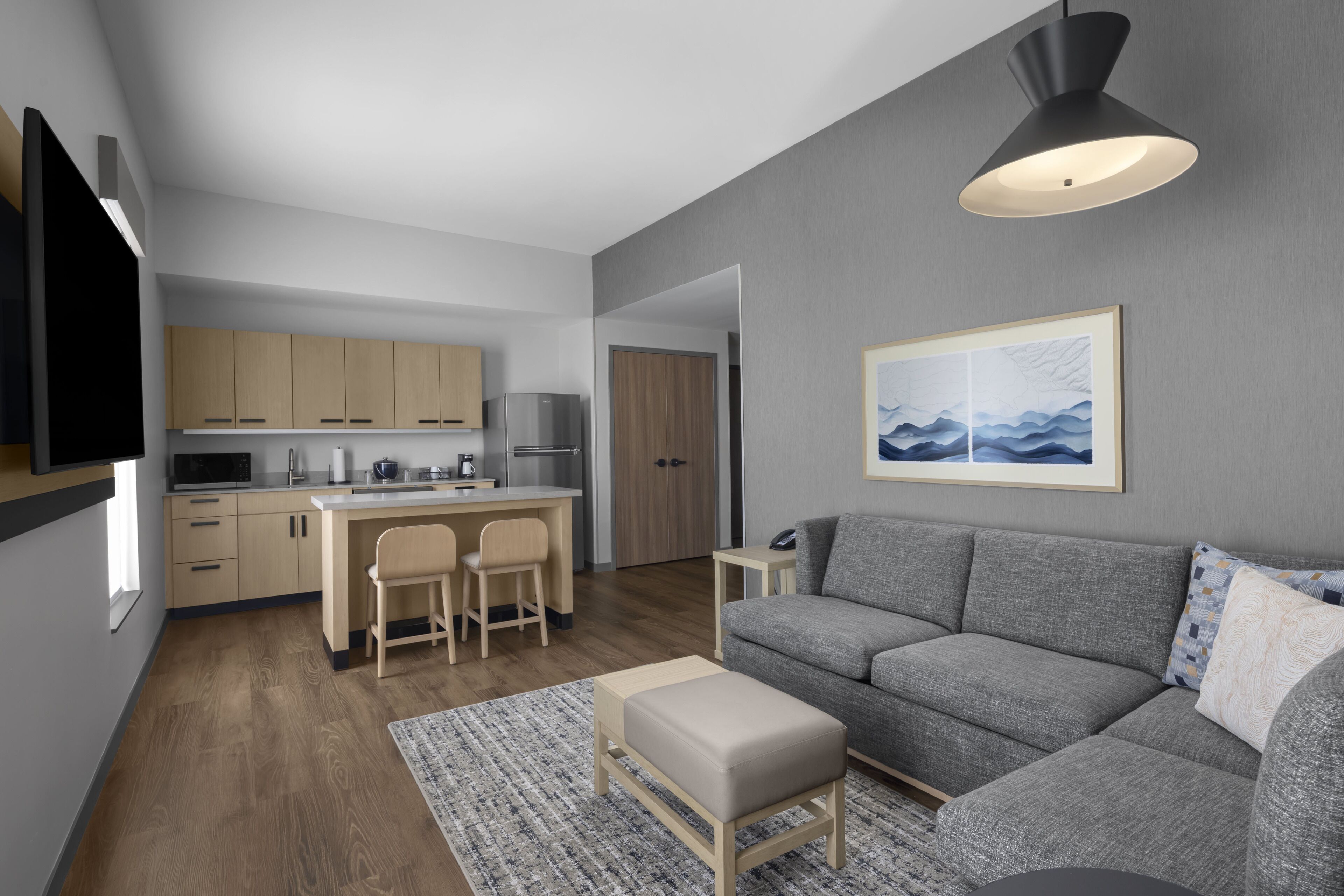 Suite, 1 King Bed with Sofa bed, Kitchenette | Living area | 55-inch Smart TV with cable channels, Netflix, streaming services