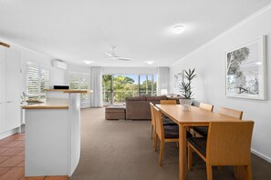 Apartment, 2 Bedrooms | Living area | 55-inch Smart TV with digital channels