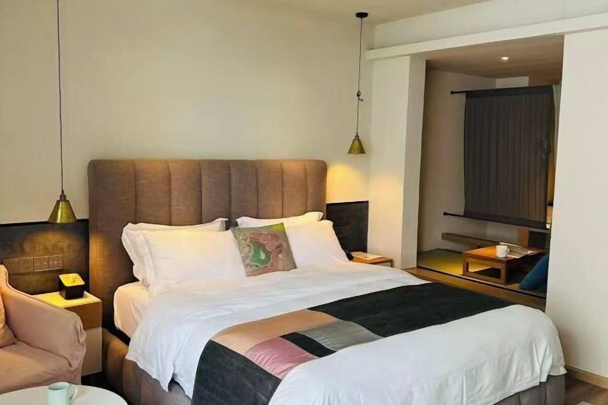 Down comforters, laptop workspace, blackout drapes, iron/ironing board