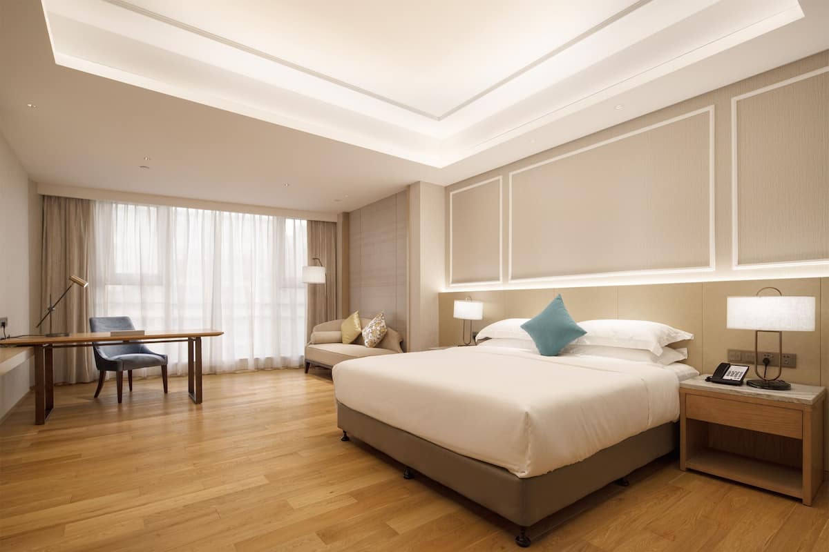 Habitación individual superior | Caja fuerte, escritorio, cortinas opacas y sistema de insonorización