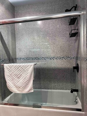 Hair dryer, towels, soap, toilet paper