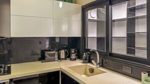 Deluxe Loft, Balcony, City View | Private kitchen - Urban Lofts Laureles 40 (Medellín)