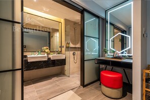 Deluxe Studio, 2 Queen Beds, Balcony, City View | Bathroom | Combined shower/tub, designer toiletries, towels, soap