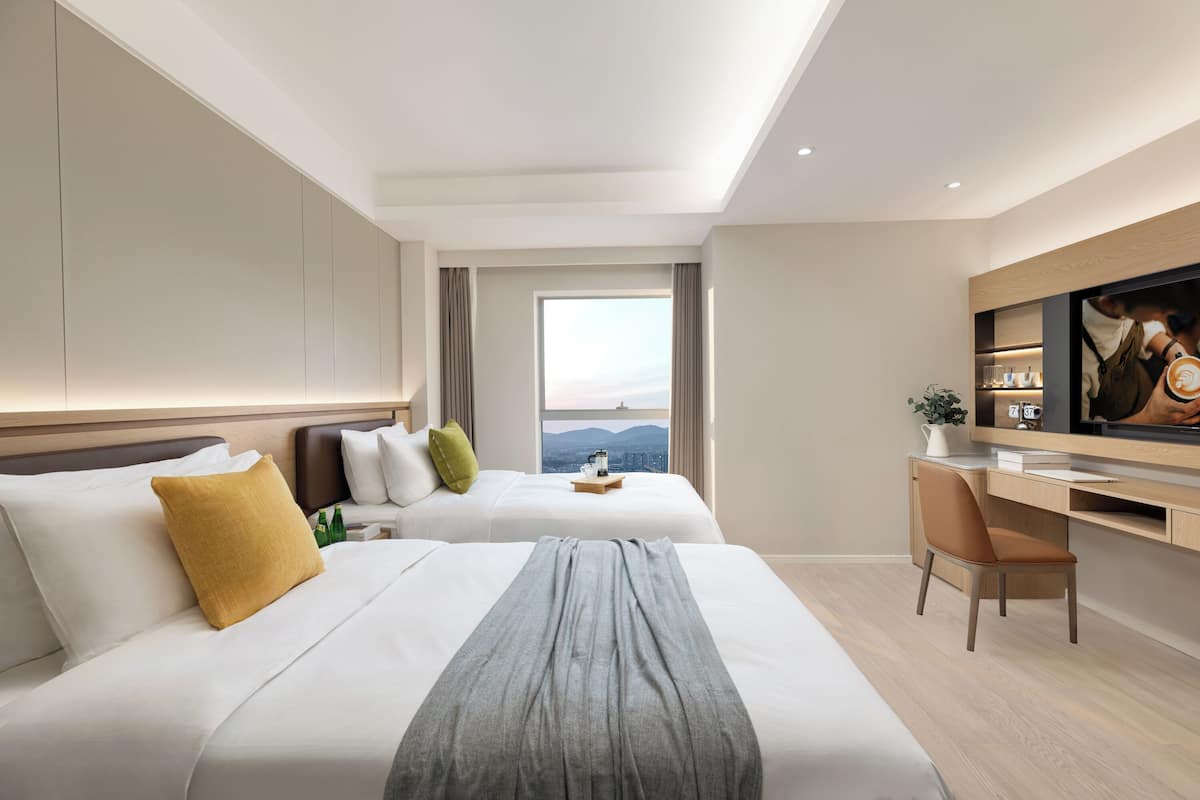 Premium bedding, down duvets, in-room safe, desk