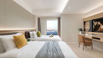 Roba de llit d'alta qualitat, cobrellits i caixa forta a l'habitació