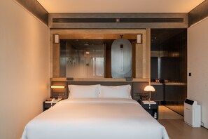 Minibar, desk, blackout curtains, iron/ironing board