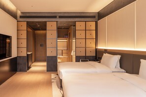 Minibar, desk, blackout curtains, iron/ironing board