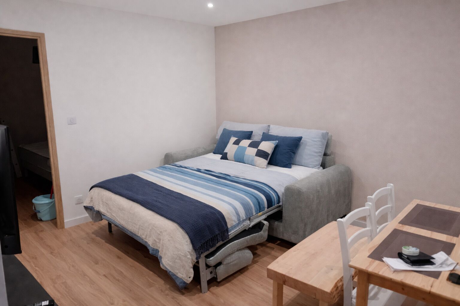 1 bedroom, desk, iron/ironing board, travel crib