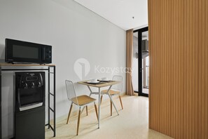 Appartamento, 1 camera da letto, vista città | Sala da pranzo
