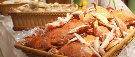 A basket of cooked crabs on ice.