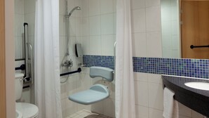 A bathroom with a shower, toilet, and sink. - Holiday Inn Express Birmingham - Walsall (Walsall)