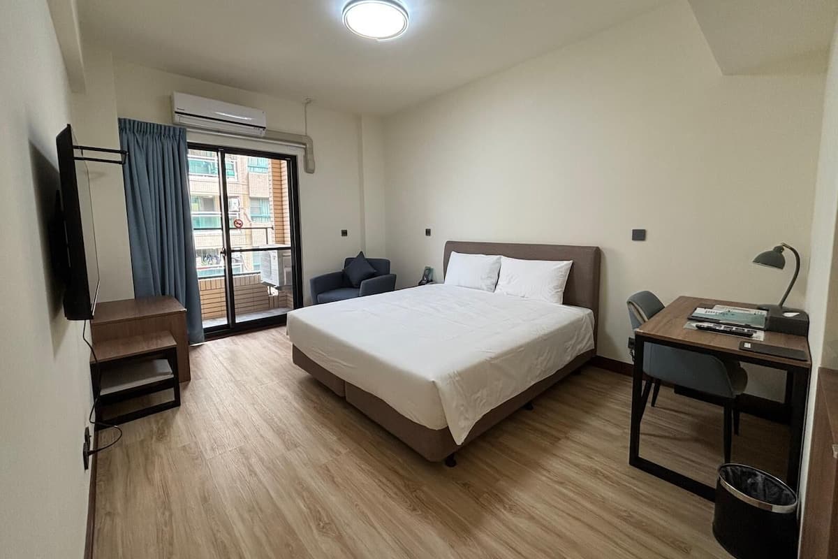 Deluxe Double Room, Balcony | Desk, blackout drapes, iron/ironing board, free WiFi
