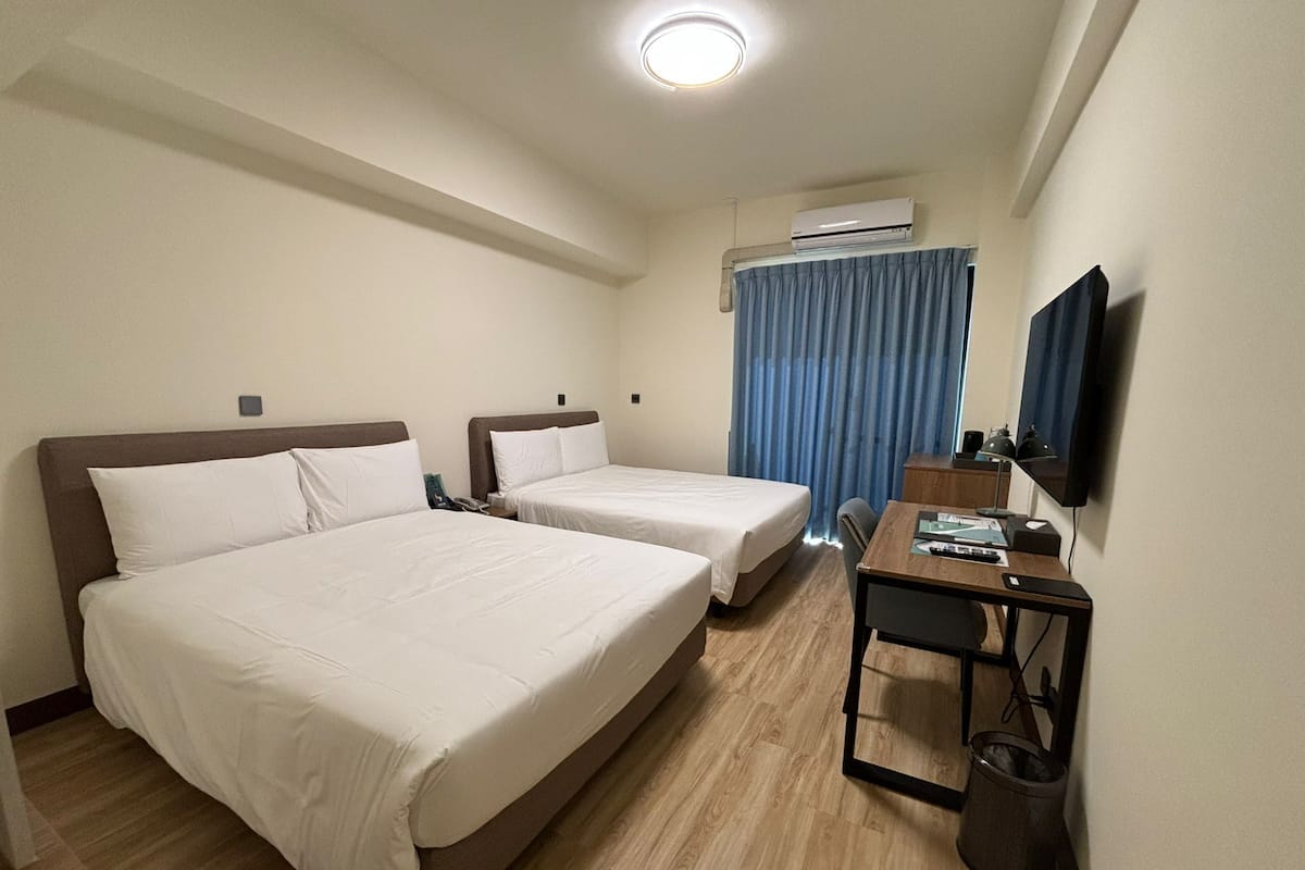 Standard Quadruple Room, Balcony | Desk, blackout drapes, iron/ironing board, free WiFi