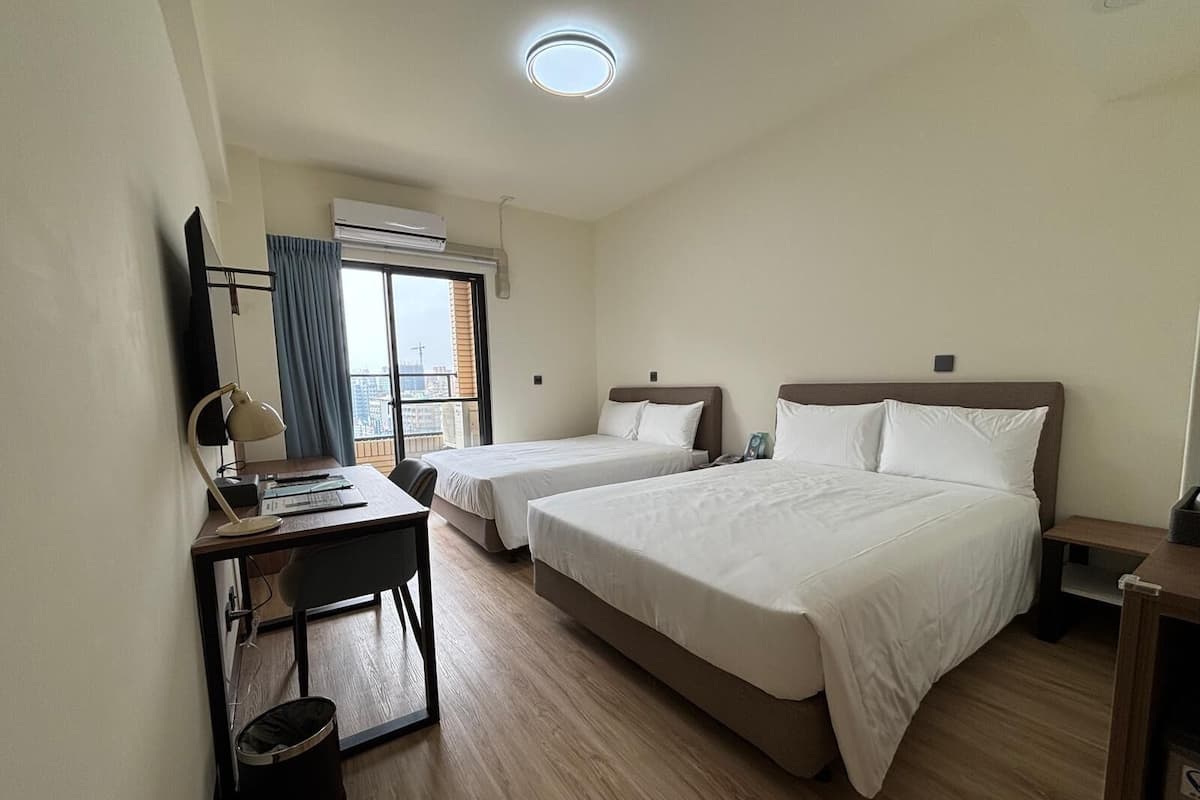 Deluxe Quadruple Room, Balcony | Desk, blackout drapes, iron/ironing board, free WiFi