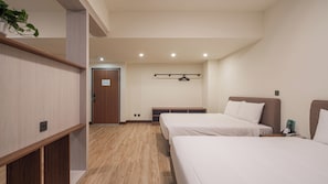 Family Suite, Balcony | Desk, blackout drapes, iron/ironing board, free WiFi